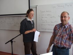 Martin Schnabl při přednášce (prof. Slovák v popředí)